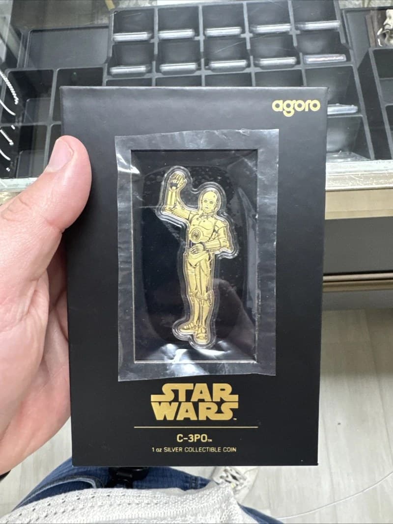 A gilded C-3PO, one ounce of silver